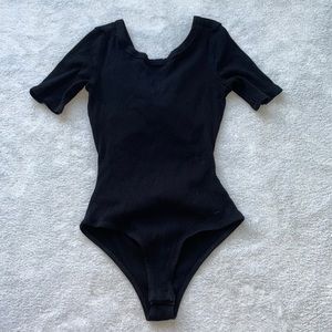 Lulu’s Lexie Lou Black Ribbed Knotted Back Bodysuit